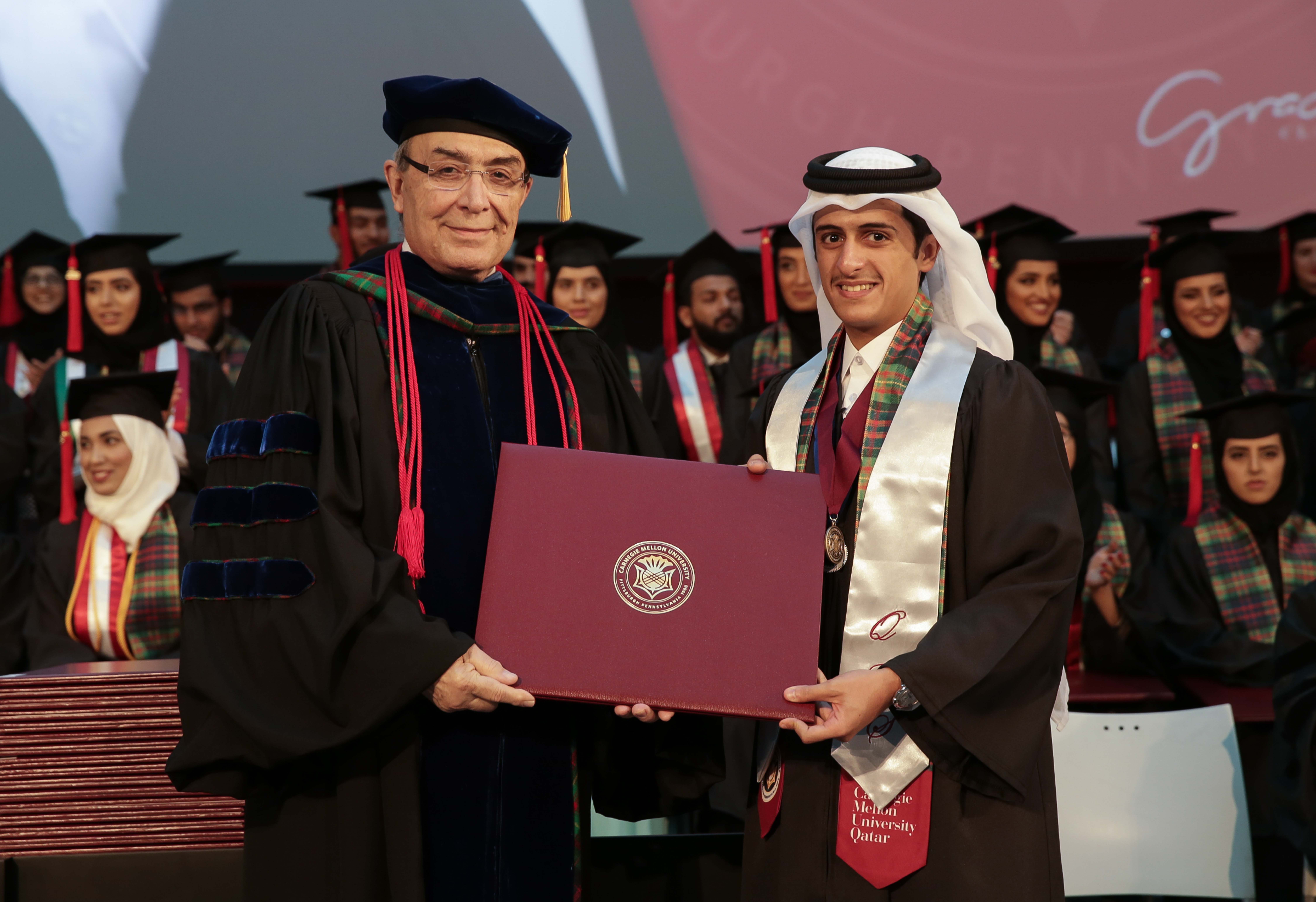 Dean and CEO of CMU-Q Ilker Baybars anda business administration gradu....jpg