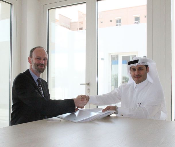 Eng Meshal Al Shamari, QGBC Director and Dr. Joachim Gottsche, Head of the Energy Efficiency Department at the German Solar Inst