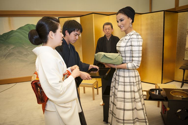Her Highness Sheikha Moza bint Nasser is introduced to a traditional Japanese tea ceremony at the Kyoto State Guest House..jpg