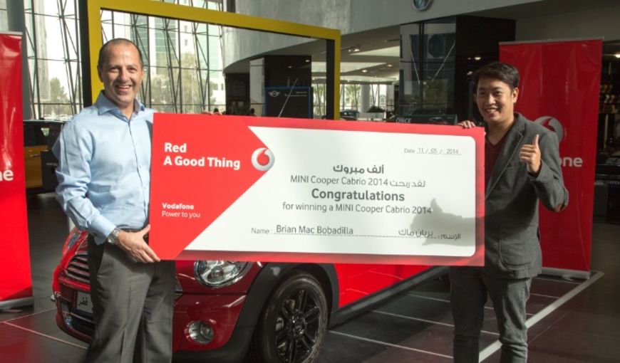 Marc Norris, Chief Commercial Officer, with RED MINI COOPER Winner