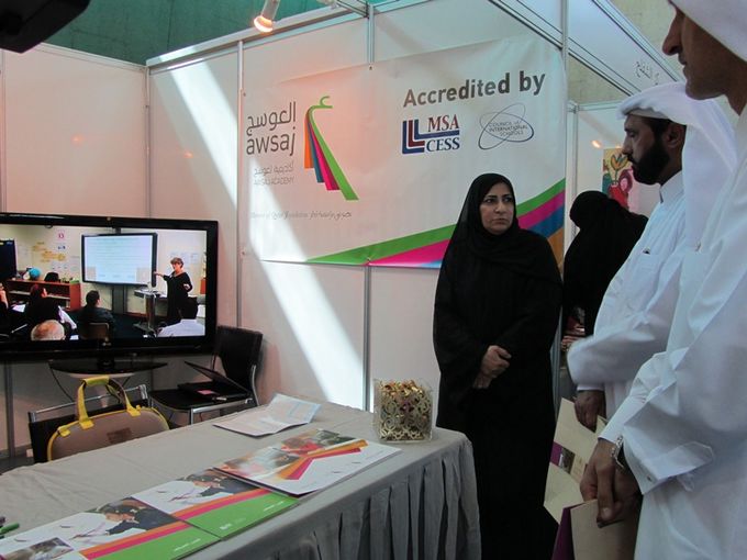 Representatives from the Ministry of Labour and Social Affairs during their visit of Awsaj Academy booth- Copy.jpg