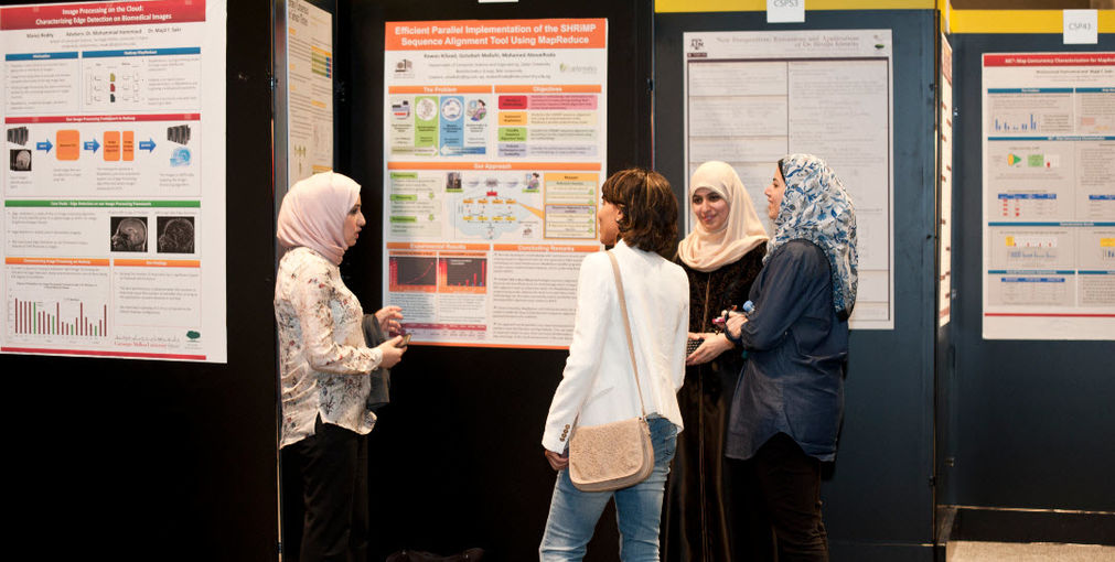 Students presenting their work at last year's Annual Research Forum.jpg