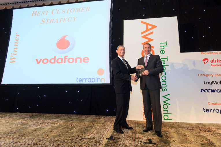 Vodafone Qatar CEO Kyle Whitehill receiving TWME Award.jpg