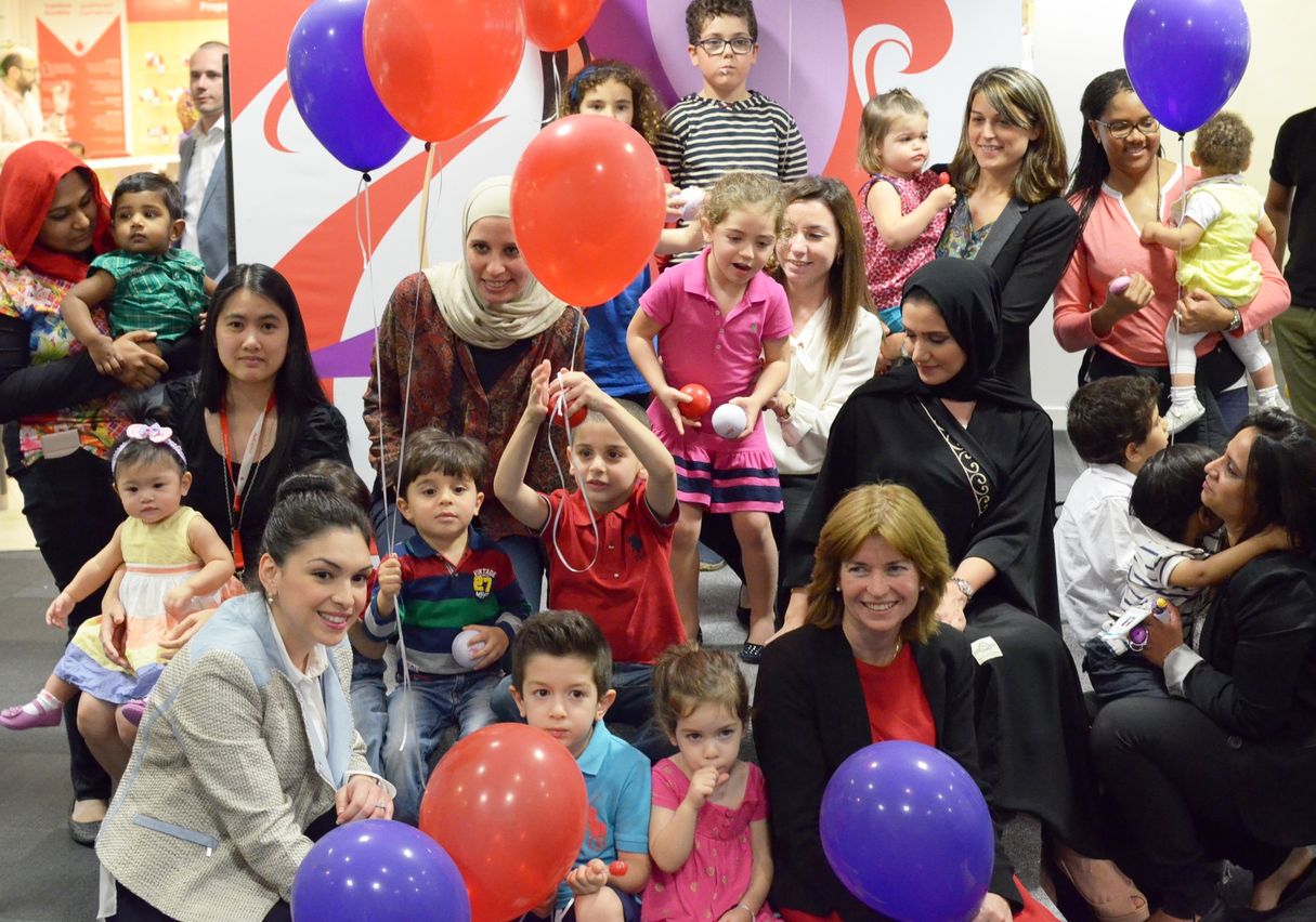 Vodafone female staff and their children